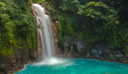 Beautiful waterfall with lush tropical landscaping in Costa Rica
